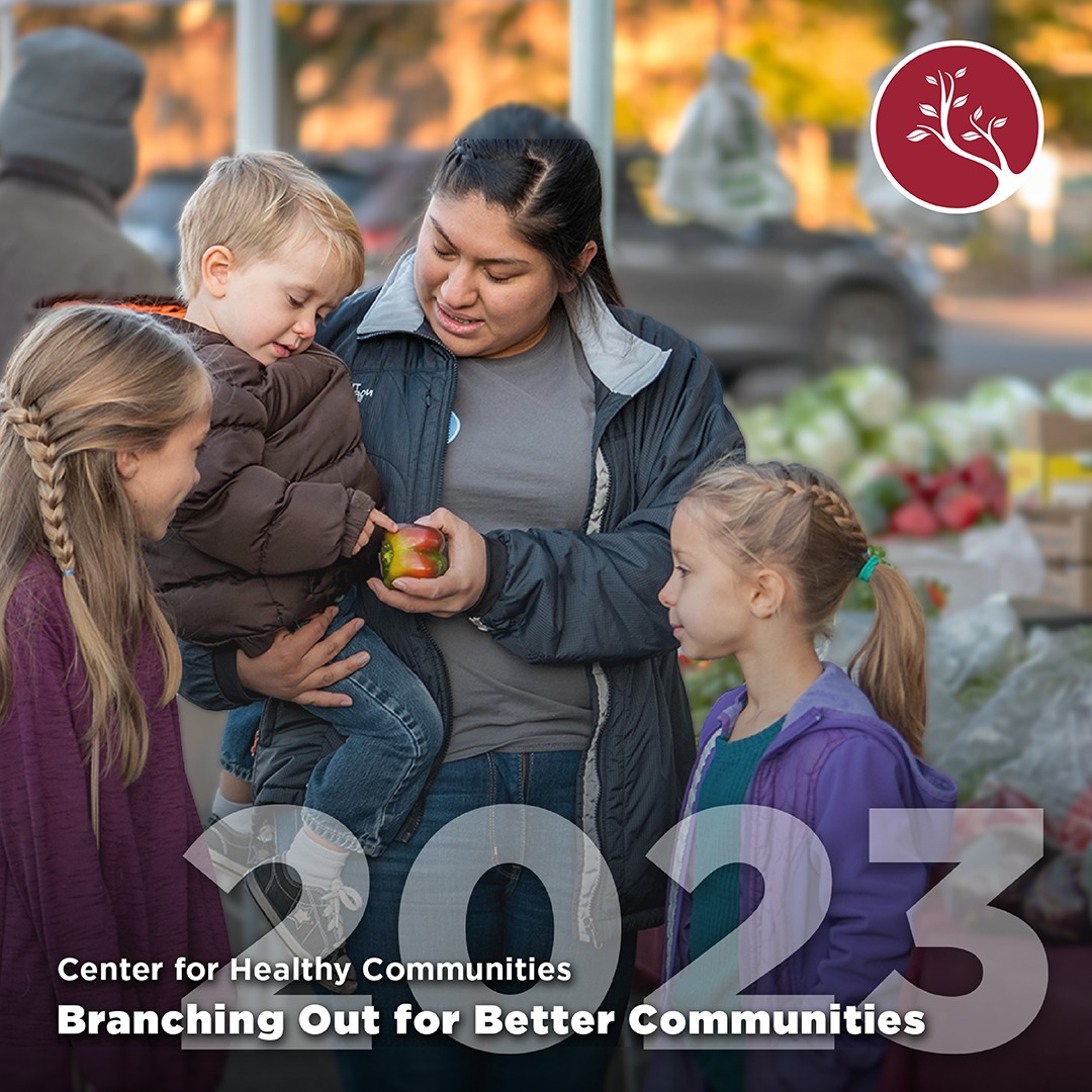 an image of center for healthy communites staff at farmers market