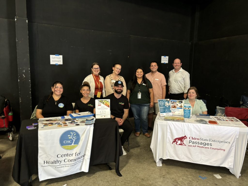 passages and center for healthy communtiies team pose for pic at senior resouce expo in glenn county